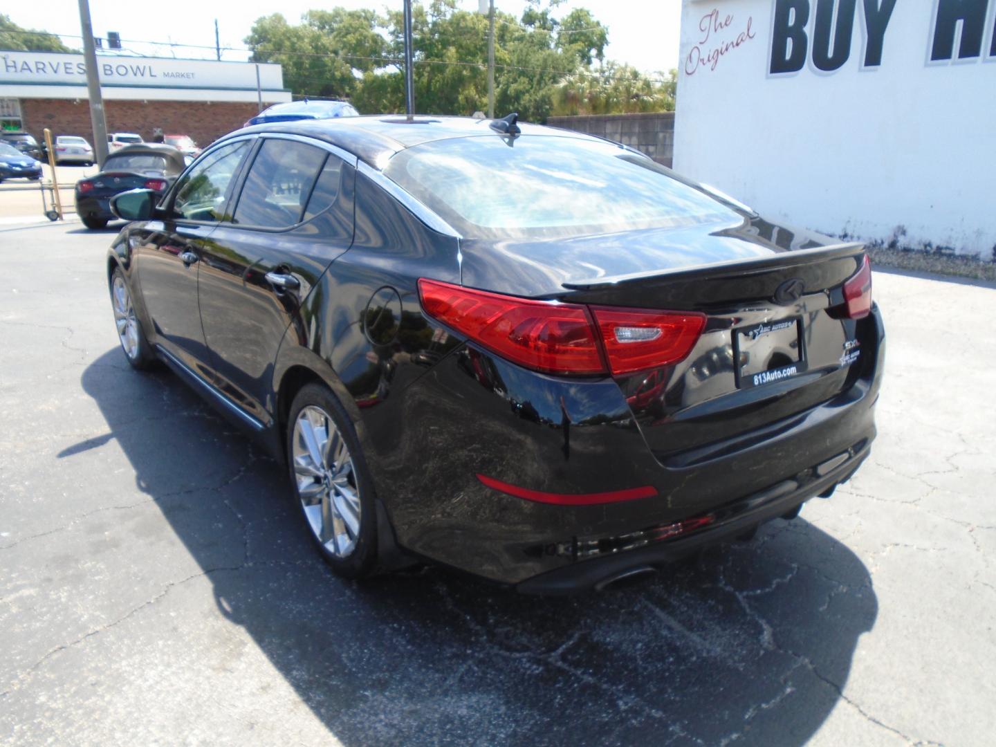 2014 Black /Grey Kia Optima SX Turbo (5XXGR4A68EG) with an 2.0L L4 DOHC 16V TURBO engine, 6-Speed Automatic transmission, located at 6112 N Florida Avenue, Tampa, FL, 33604, (888) 521-5131, 27.954929, -82.459534 - Photo#4